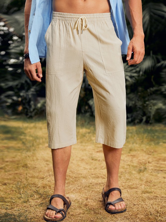 Side view of Men Casual Plain All Season Natural Vacation Loose Capris Cotton H-Line Pants