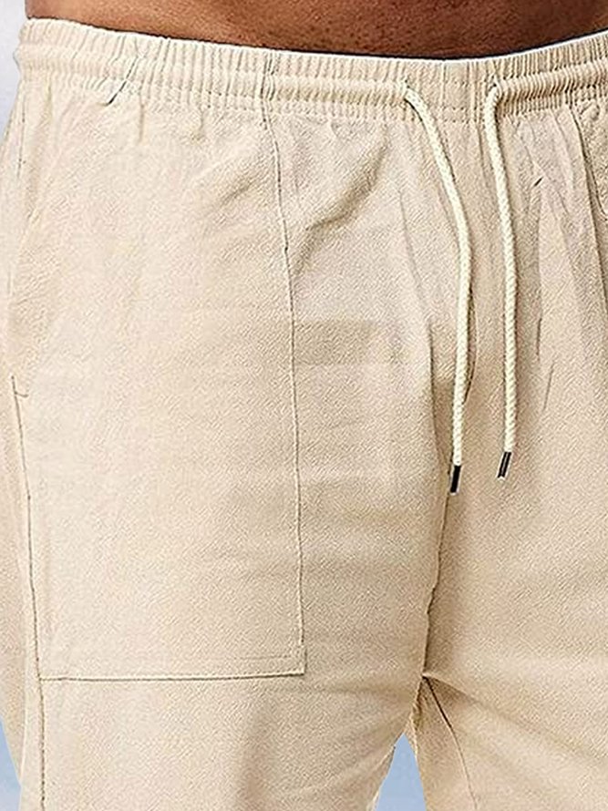 Side view of Men Casual Plain All Season Natural Vacation Loose Capris Cotton H-Line Pants
